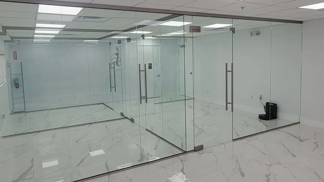 Interior glass wall partition Miami office commercial space