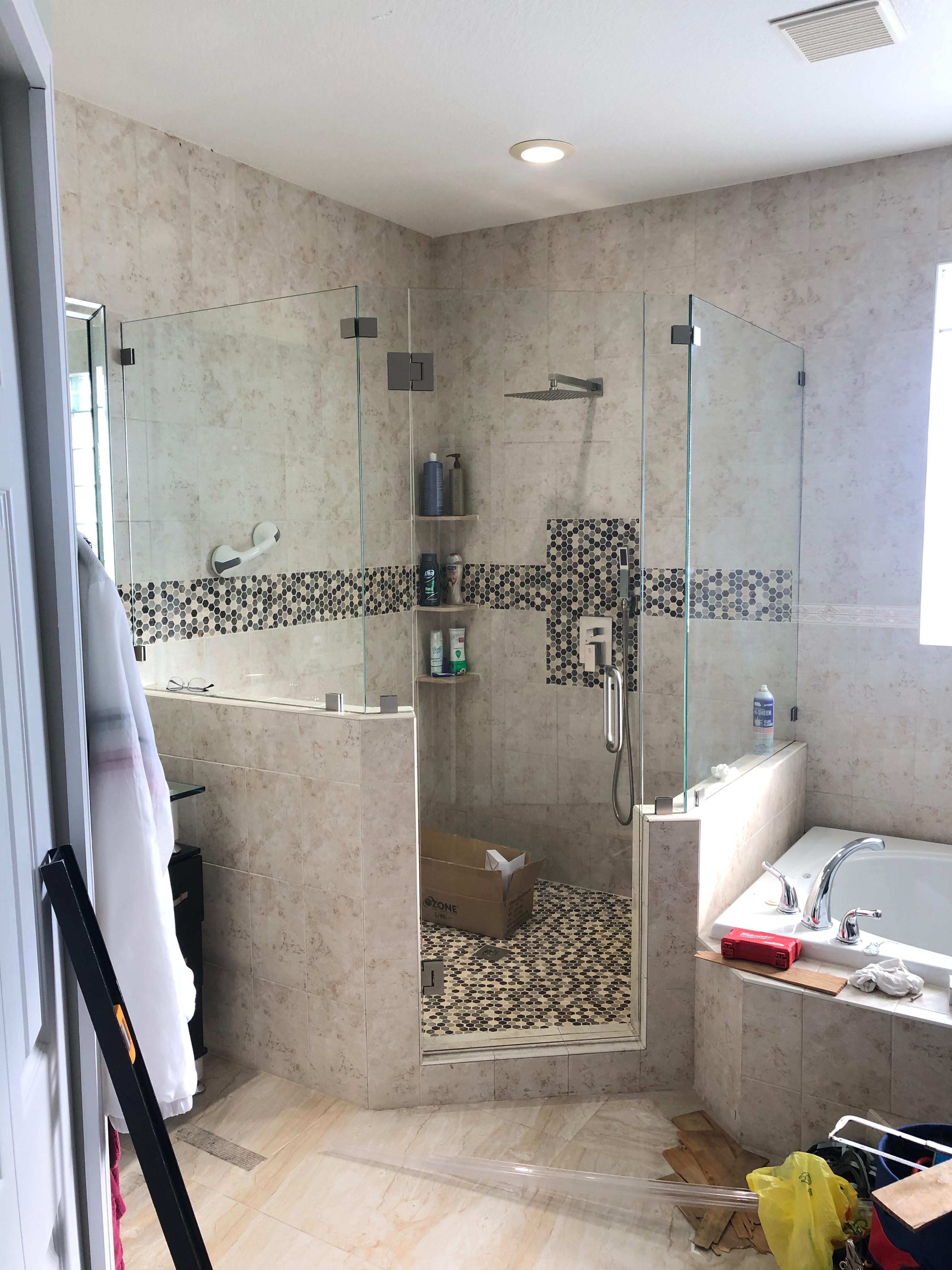 Neo-angle frameless shower enclosure chrome hardware South Florida
